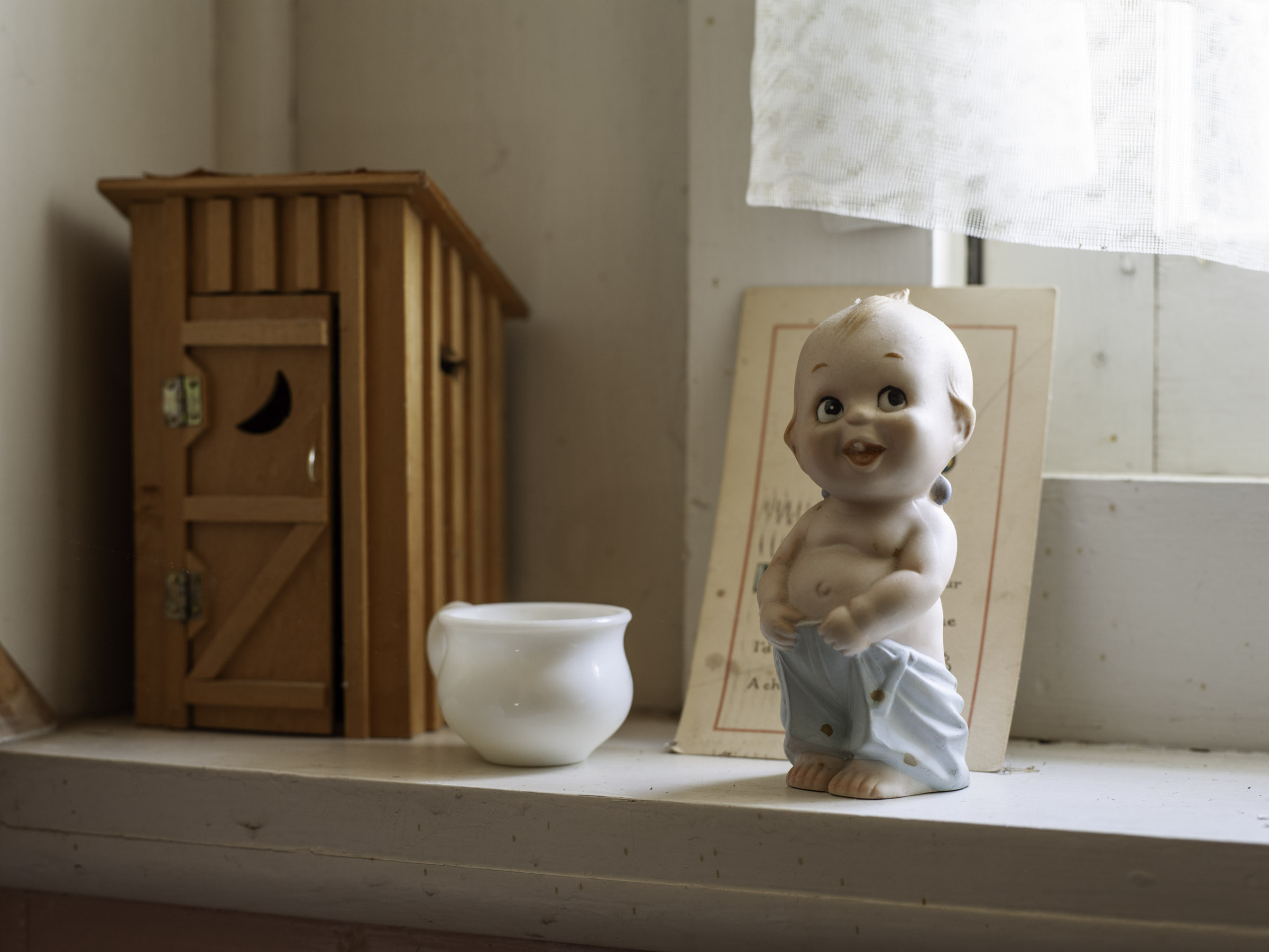 Kewpie in the bathroom